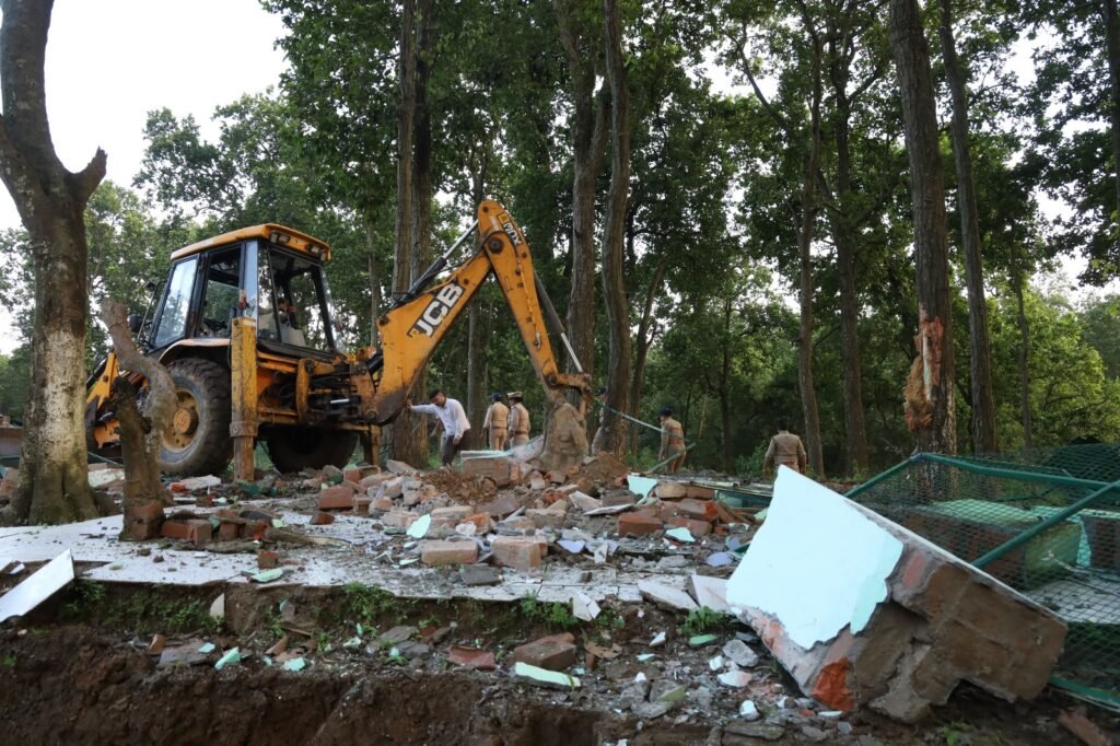 The district administration continues to crackdown on illegal encroachment; the mazaar built on forest land demolished