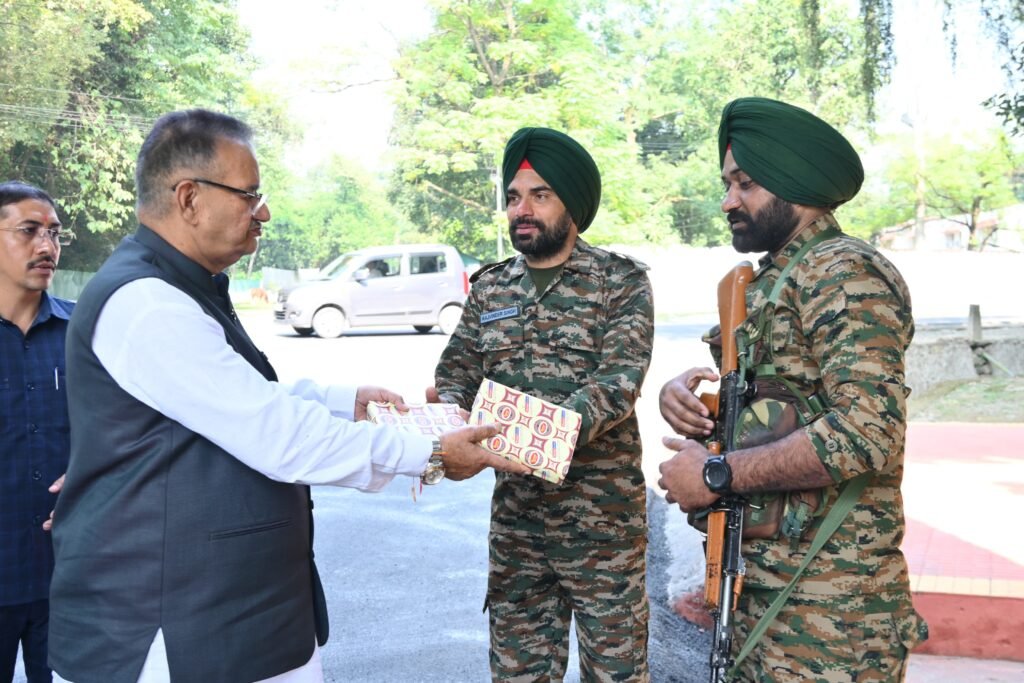 Soldier Welfare Minister Ganesh Joshi meeting Indian Army soldiers on duty in Garhi Cantt area and wishing them Happy Diwali